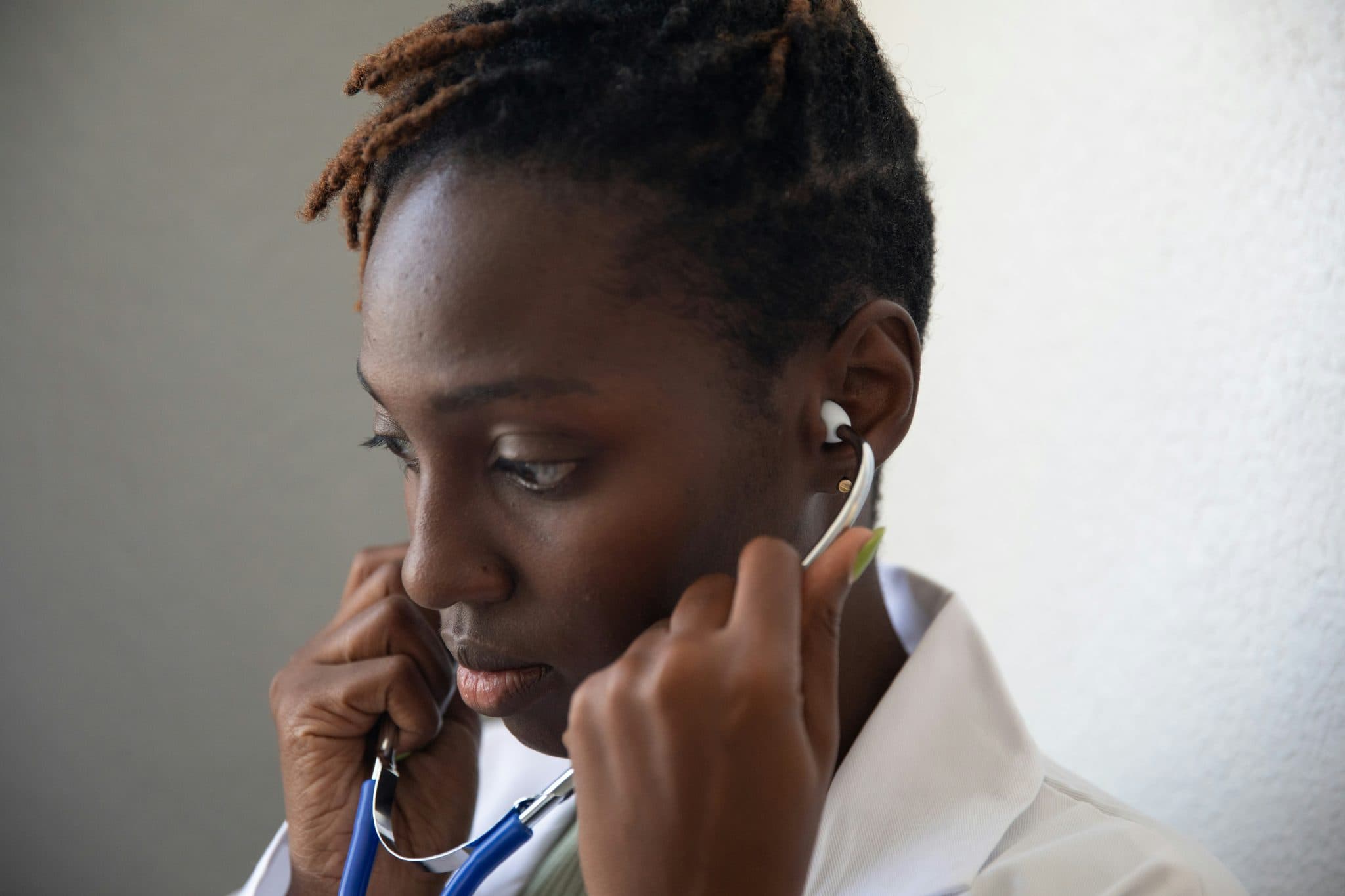 Healthcare professional reviewing patient information